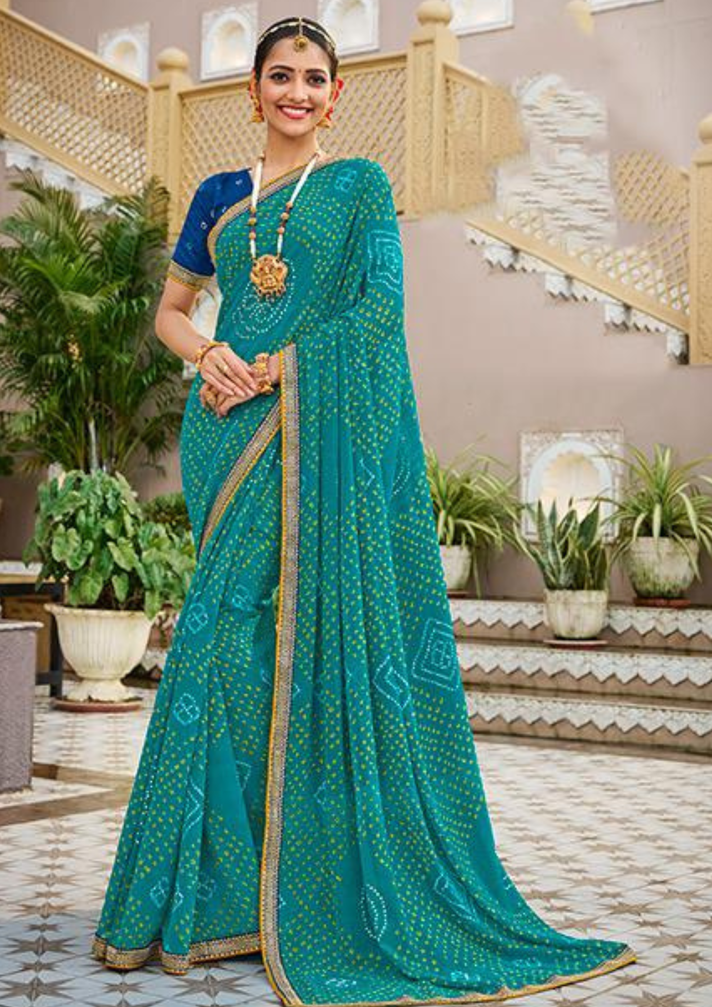 Teal Blue Bandhej Georgette Saree with Mirror Gota Border and Navy Blue Blouse