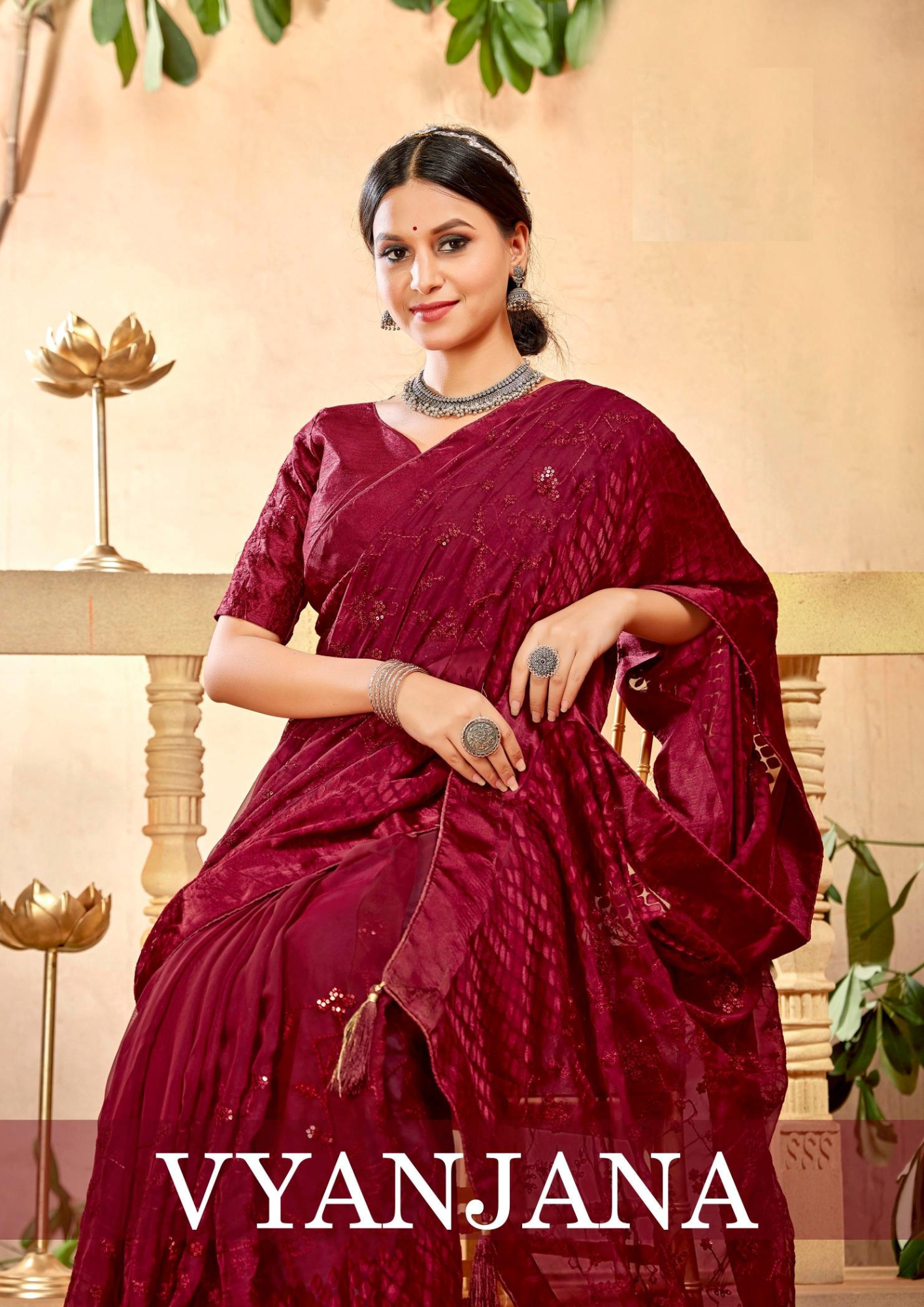 Vyanjana Regal Maroon Designer Silk Saree with Elegant Embellishments
